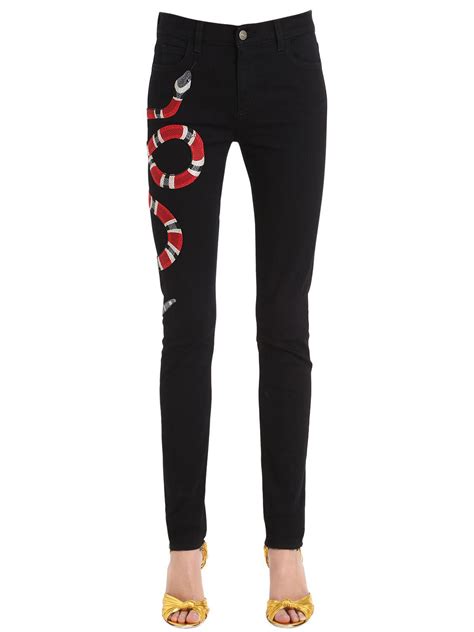 black jeans with snake gucci|gucci snake jeans women.